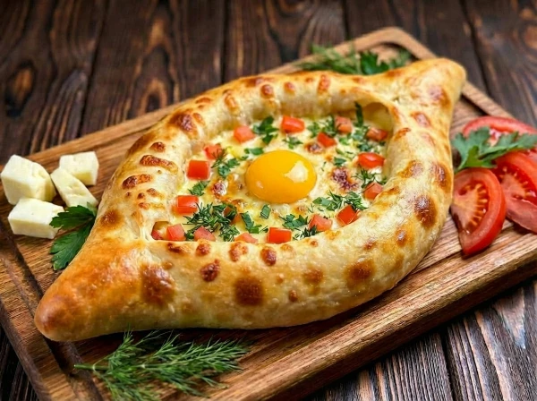 Хачапури по-аджарски с томатами и зеленью