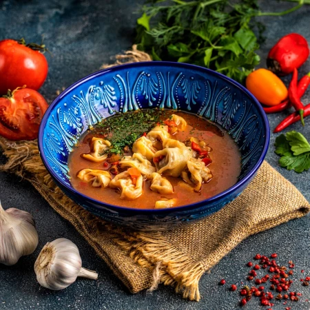 "Чучвара ручной лепки с телятиной в мясном бульоне с овощами