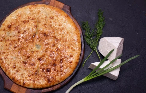 Осетинский пирог с луком и укропом и сыром
