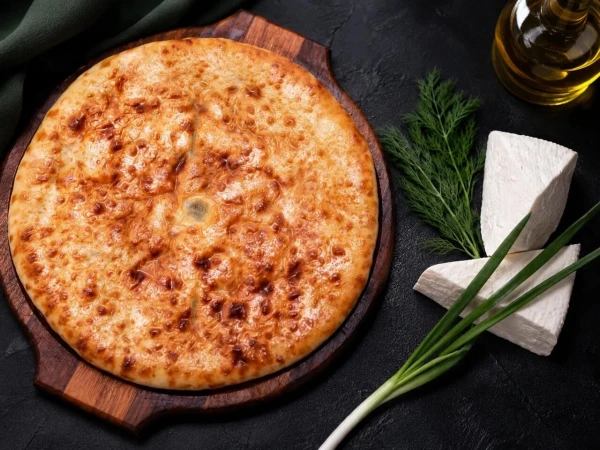 Осетинский пирог с луком и укропом и сыром