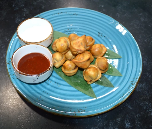 Пельмени жареные