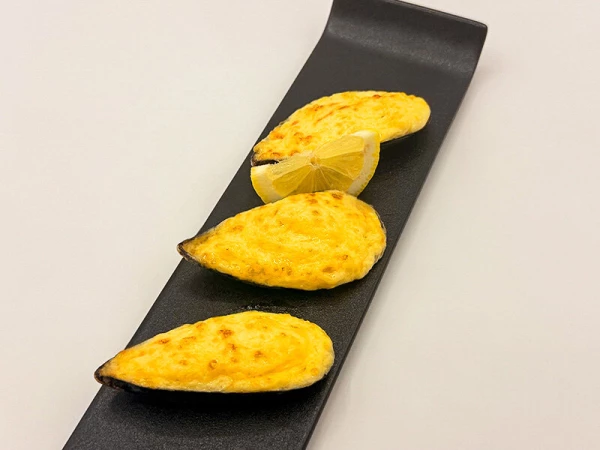 Мидии запеченные под сырным соусом