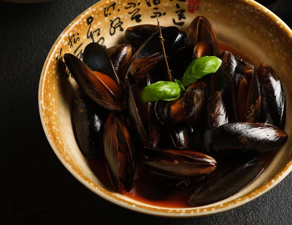 Мидии в  томатном  соусе