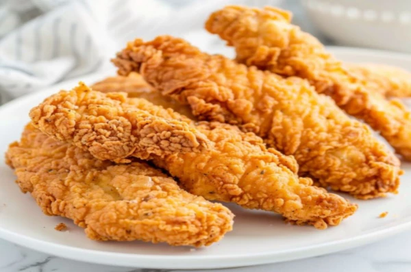 Стрипсы куриные с сырным соусом