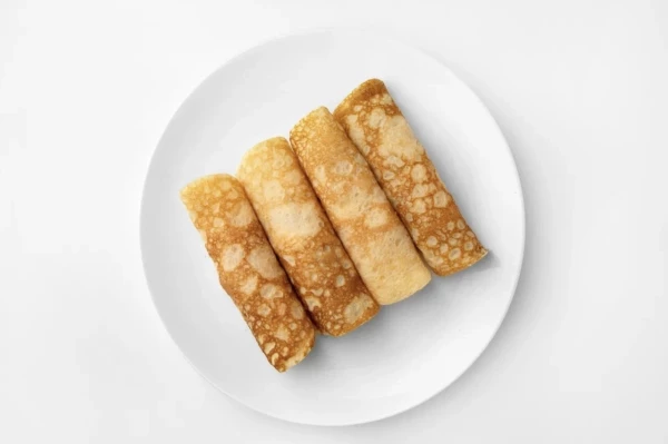 Рулетики из омлета с ветчиной и сыром