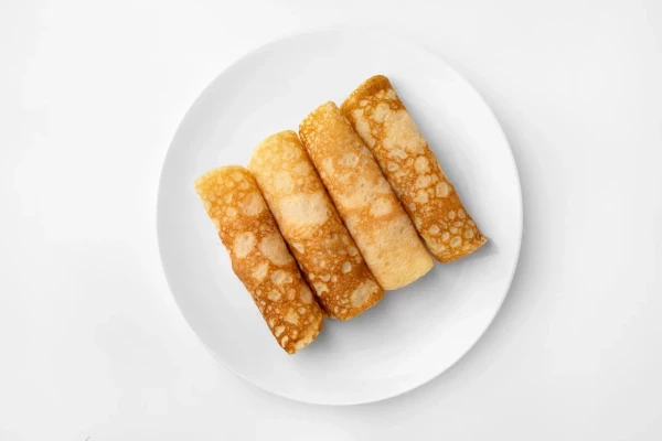 Рулетики из омлета с ветчиной и сыром