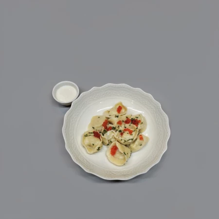 Пельмени из щуки со сметаной и икрой из форели 