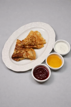 Блины с вареньем из морошки 