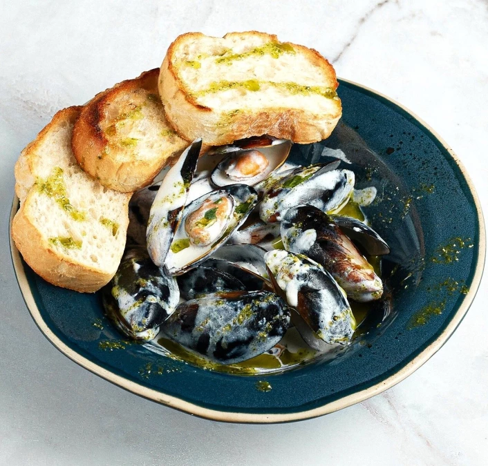 Мидии в створках в сливочном соусе 