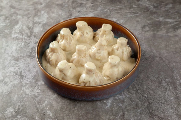 Мини - хинкали с курицей в сырном соусе (10 шт.)