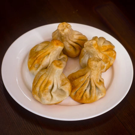 Хинкали со свининой и говядиной жаренные