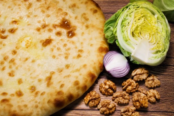 Осетинский пирог с капустой и грецким орехом