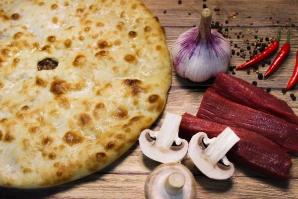 Осетинский пирог с мясом и грибами