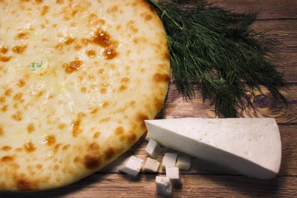 Осетинский пирог с сыром и зеленью