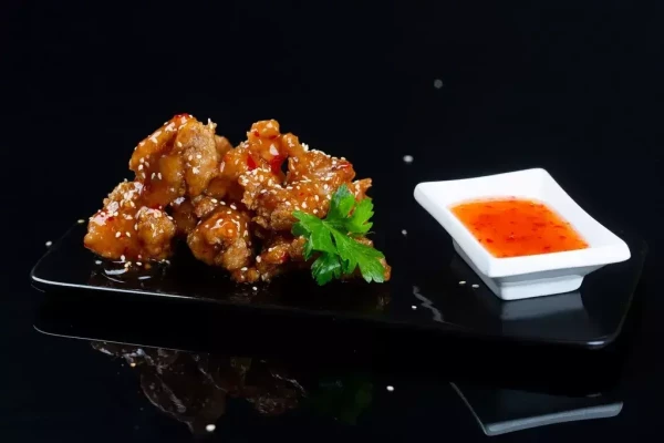 Курица в кисло-сладком соусе 180г