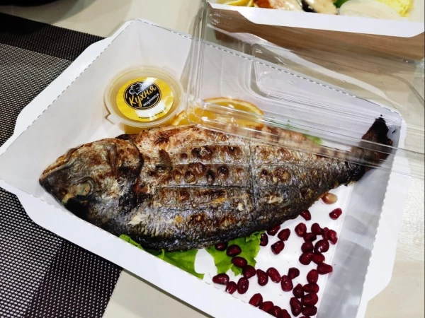 Дорадо на углях с апельсиновым соусом