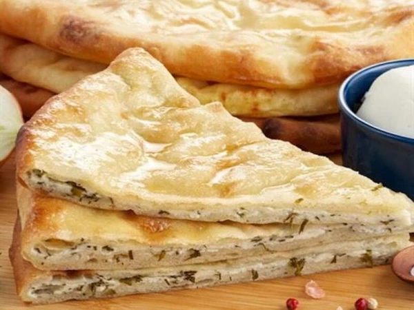 Осетинский пирог с сыром и зеленью