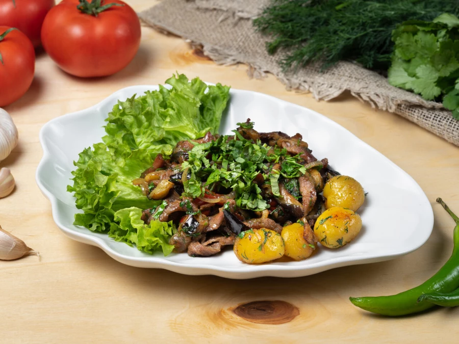 Телятина с овощами