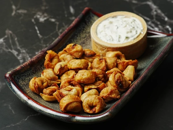 Пельмени жареные