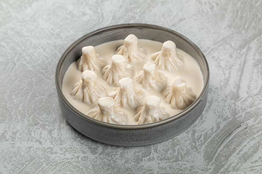 Мини - хинкали с курицей в сырном соусе (10 шт.)