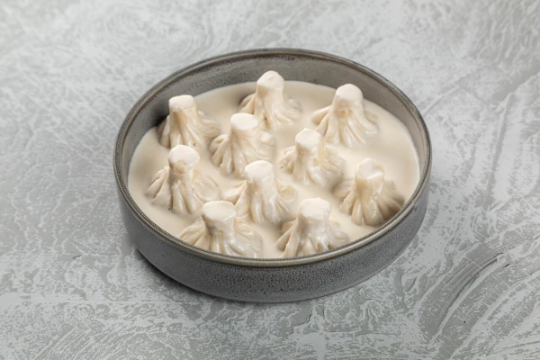 Мини - хинкали с курицей в сырном соусе (10 шт.)